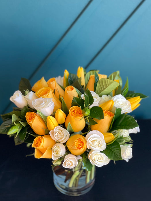 Bright mixed flower arrangement in a vase