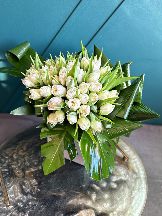 50 White Tulips In ceramic vase
