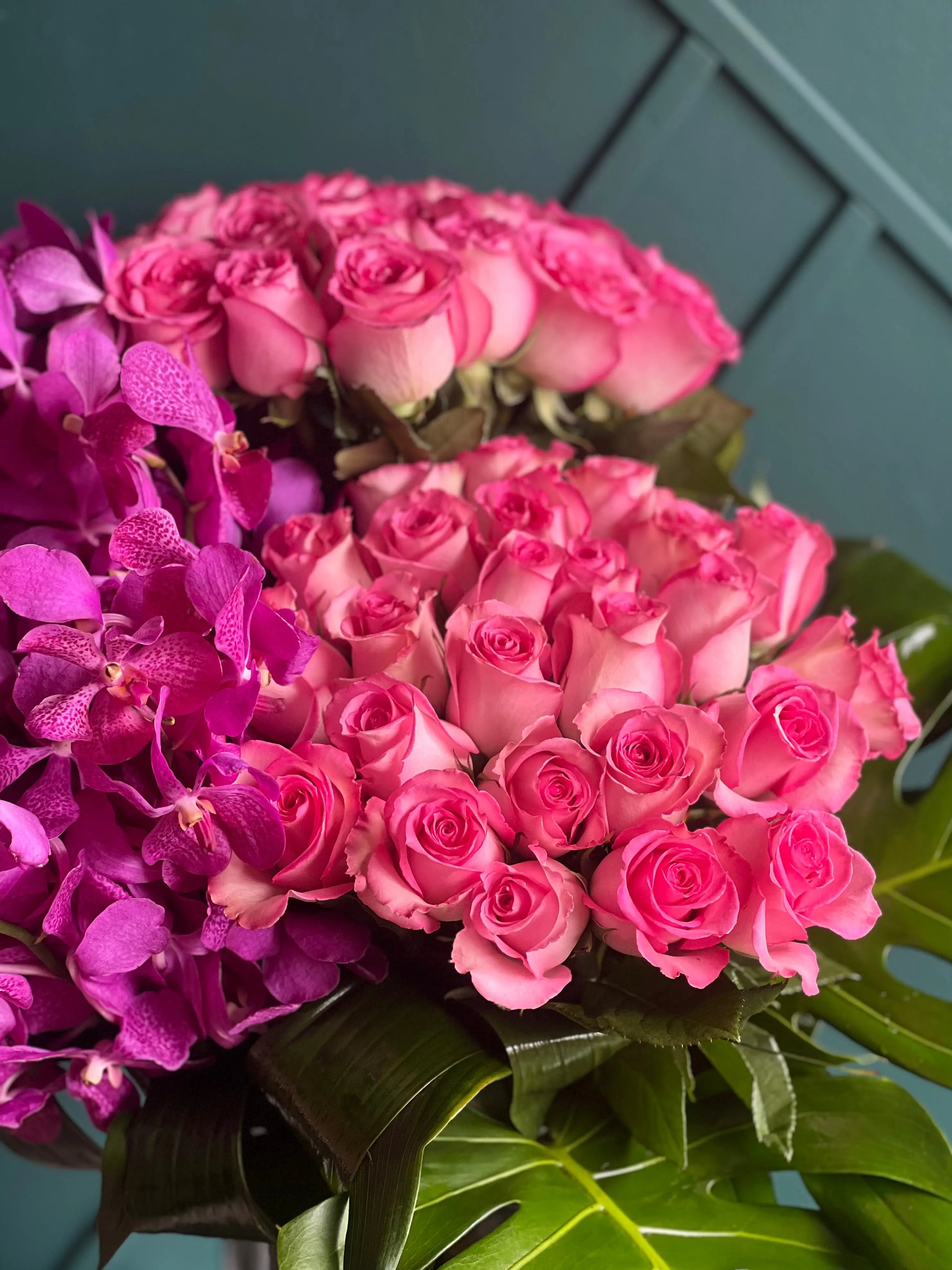 Roses & Mokara Orchids Arrangement | Luxury Tropical Floral Design buy online Luxury Flowers Miami