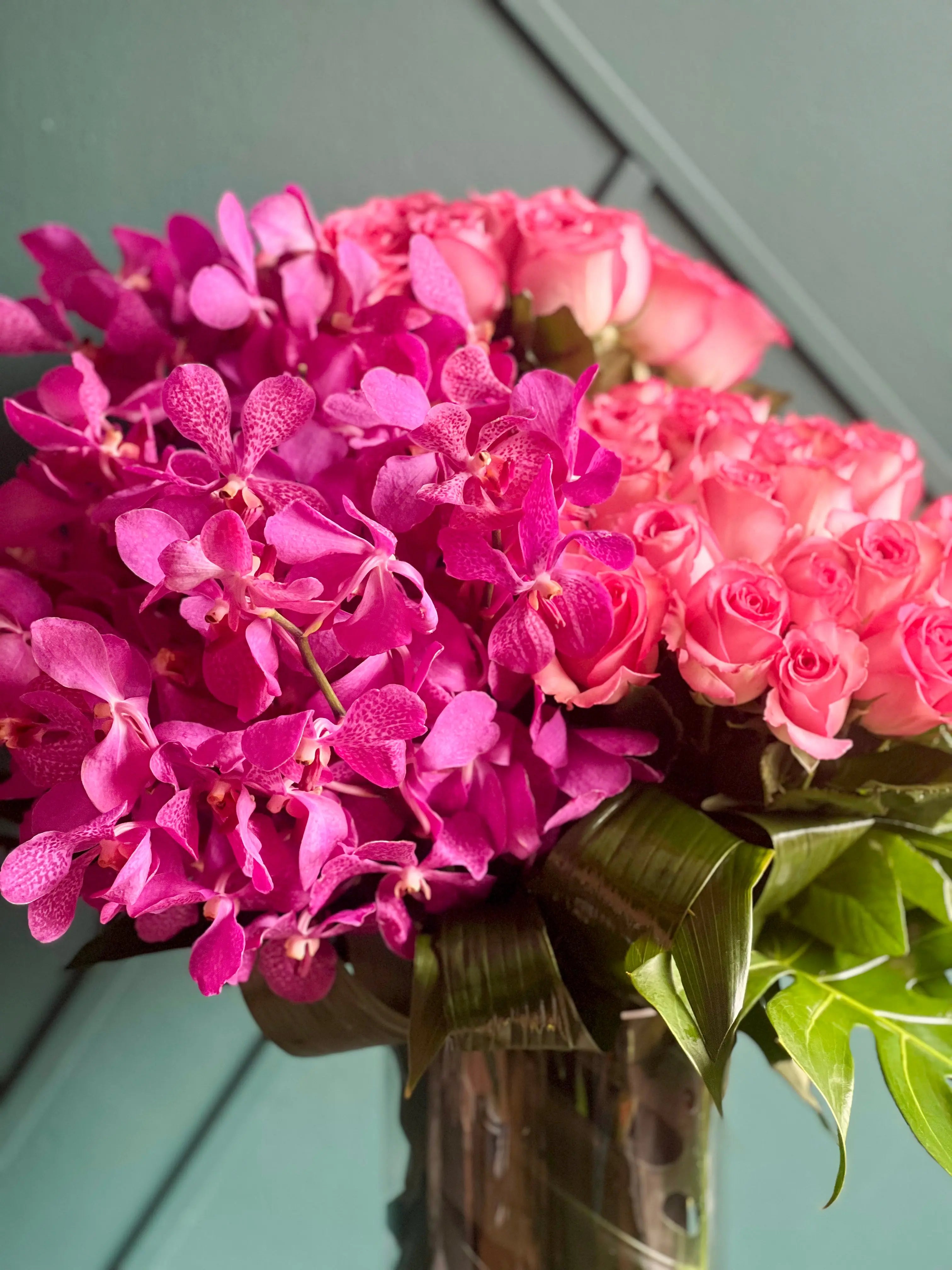Roses & Mokara Orchids Arrangement | Luxury Tropical Floral Design buy online Luxury Flowers Miami