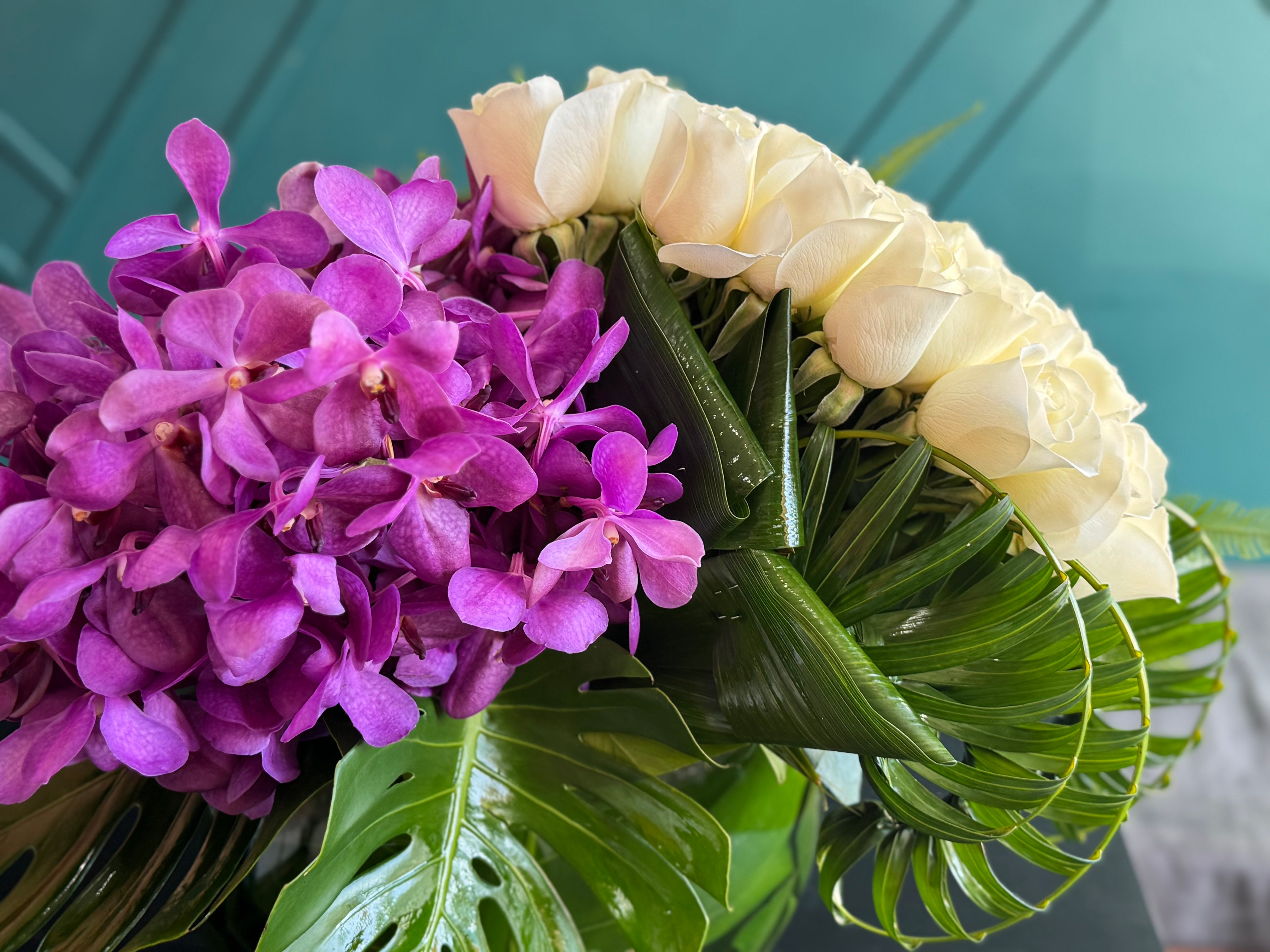 50 White Roses & Mokara Orchids Luxury Arrangement