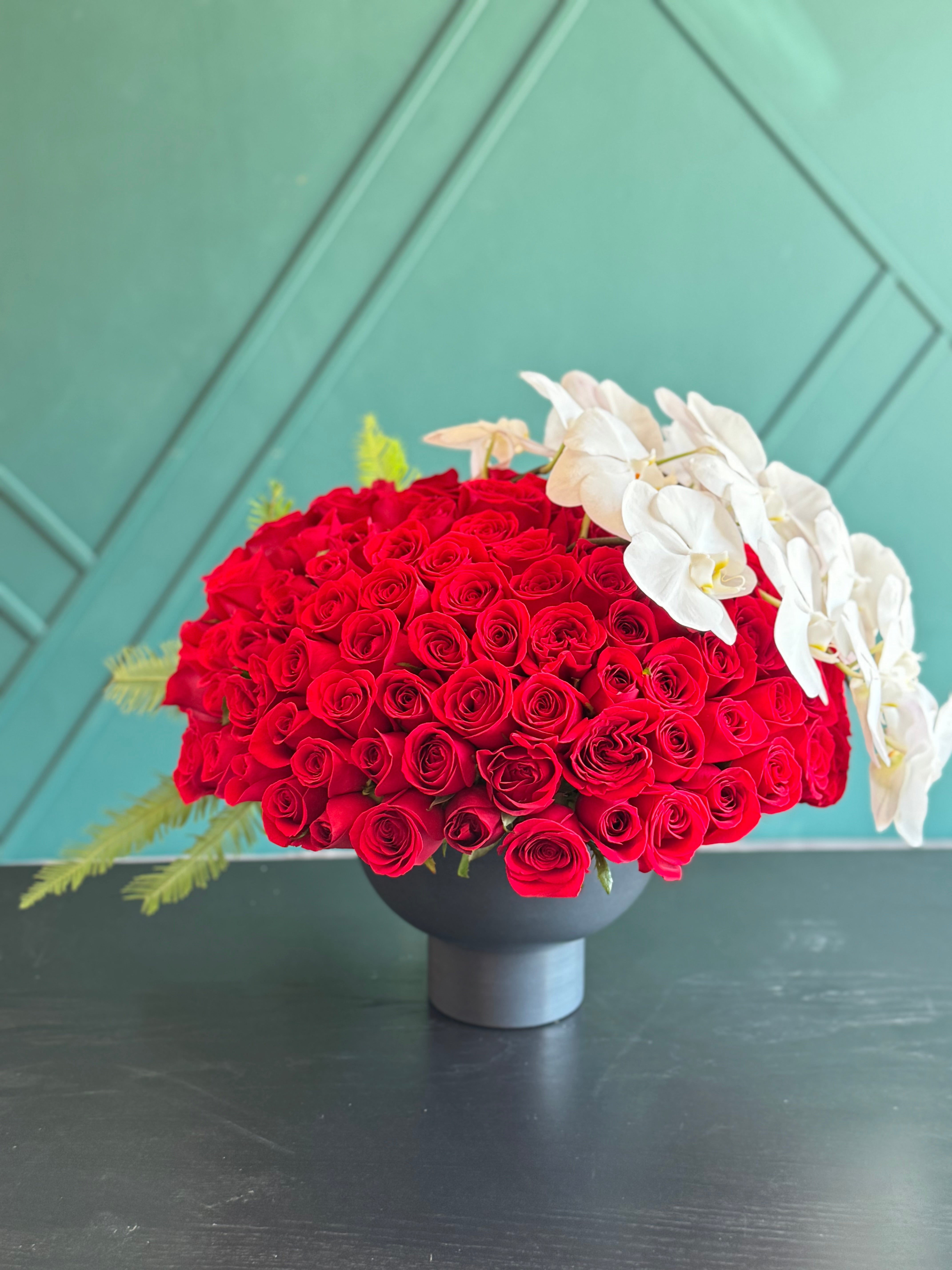 150 Red Roses & White Phalaenopsis Luxury Arrangement