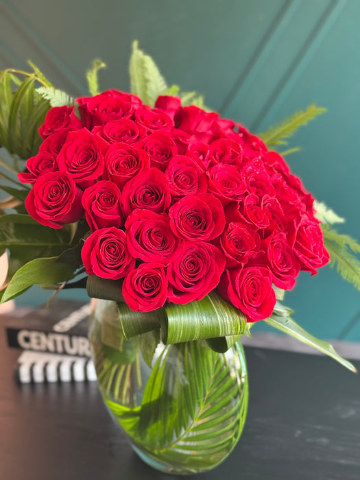 50 roses in modern "moon" vase