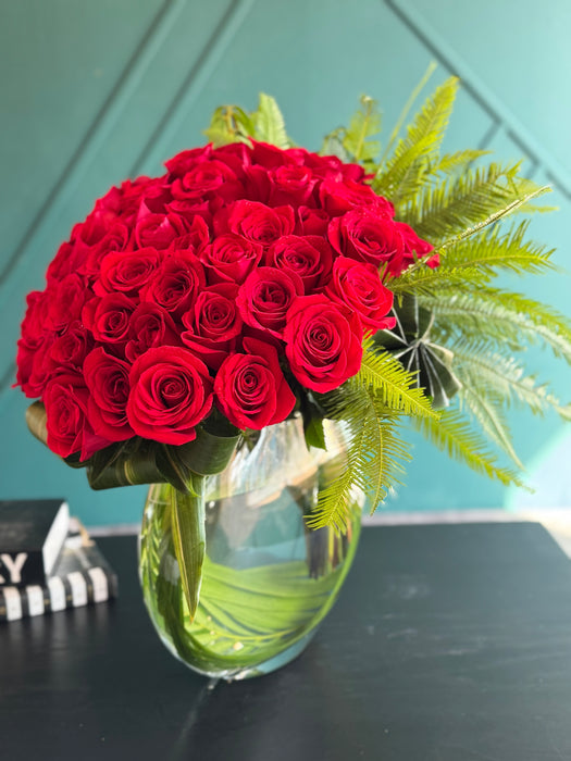 50 roses in modern "moon" vase