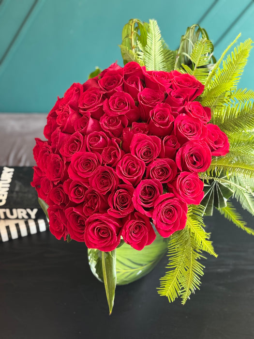 50 roses in modern "moon" vase