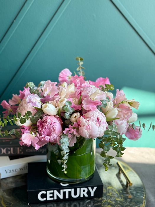 Spring arrangement with peonies in a vase