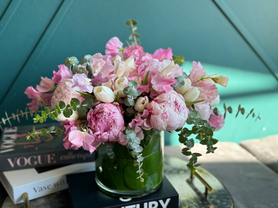Spring arrangement with peonies in a vase