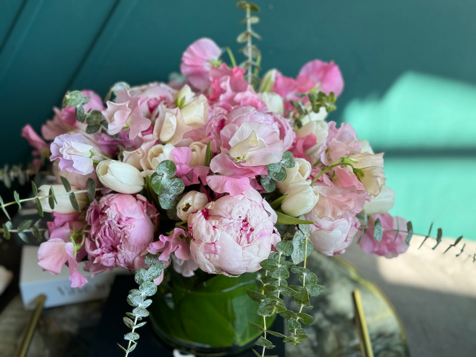 Spring arrangement with peonies in a vase
