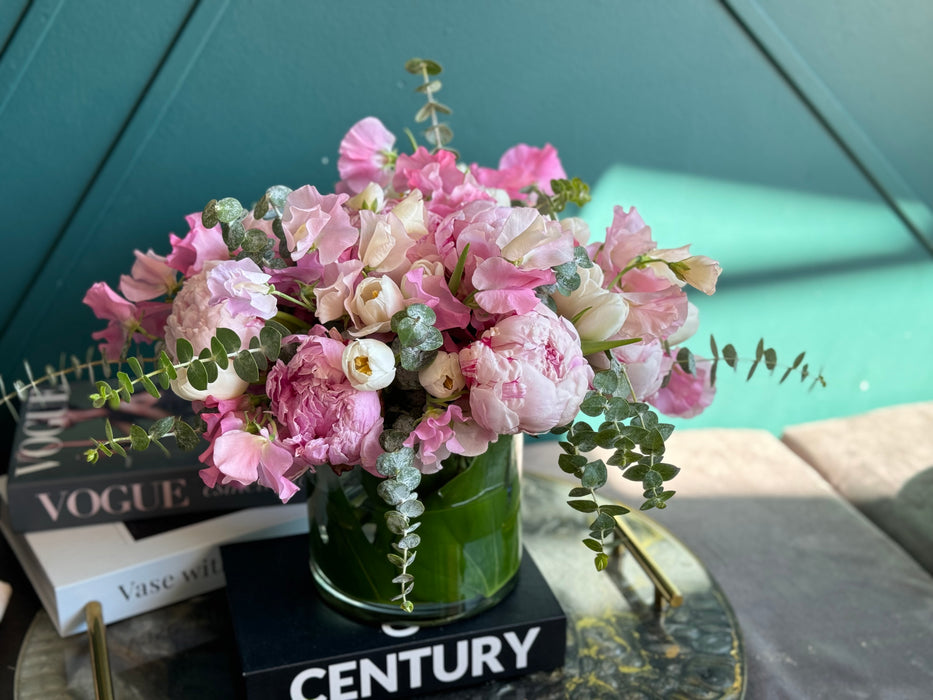 Spring arrangement with peonies in a vase