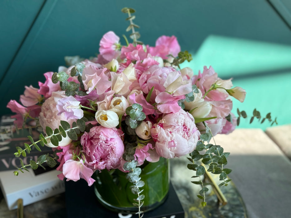 Spring arrangement with peonies in a vase