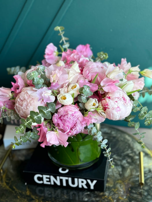Spring arrangement with peonies in a vase
