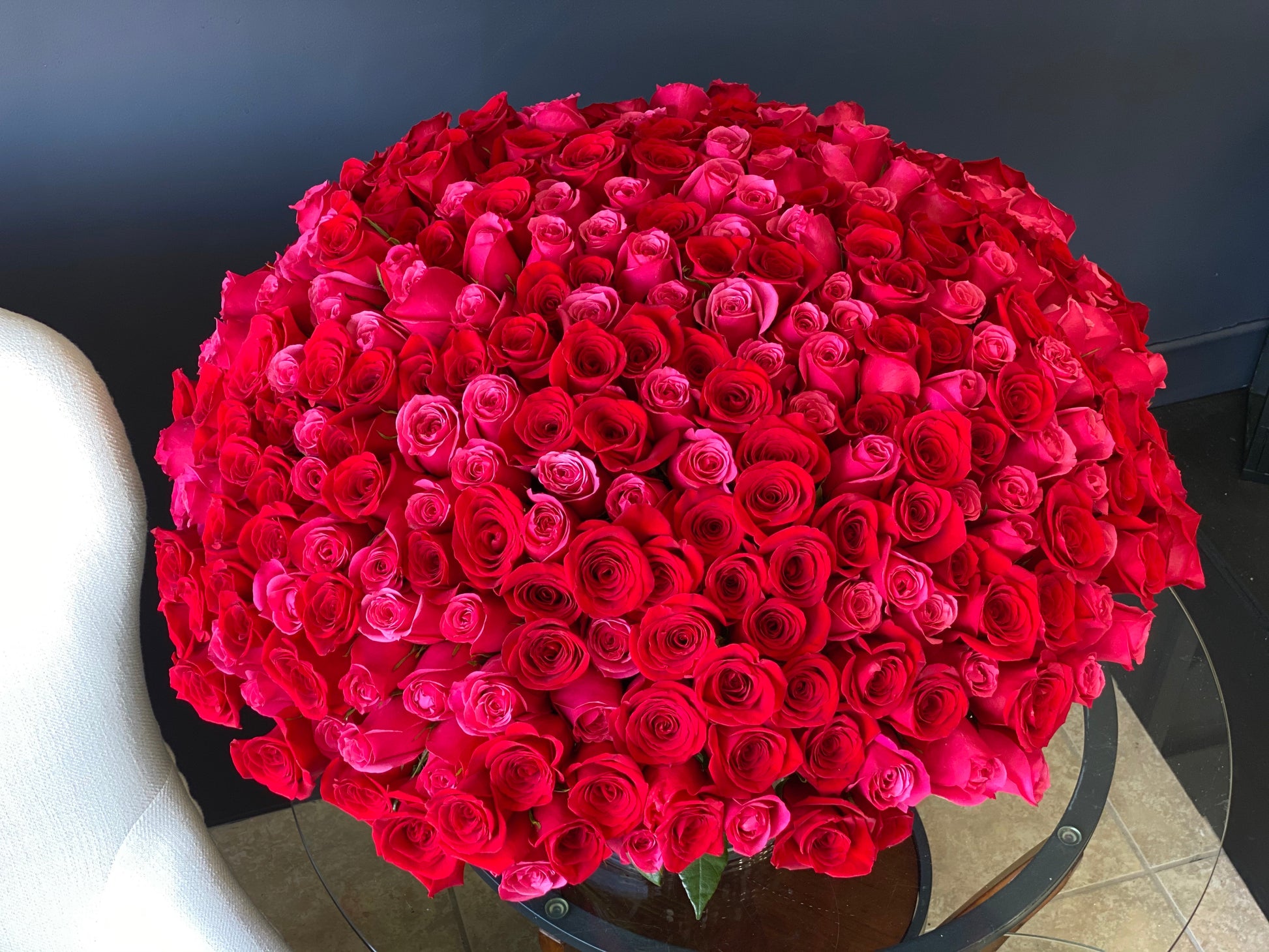 giant red and pink rose arrangement in vase Miami Beach