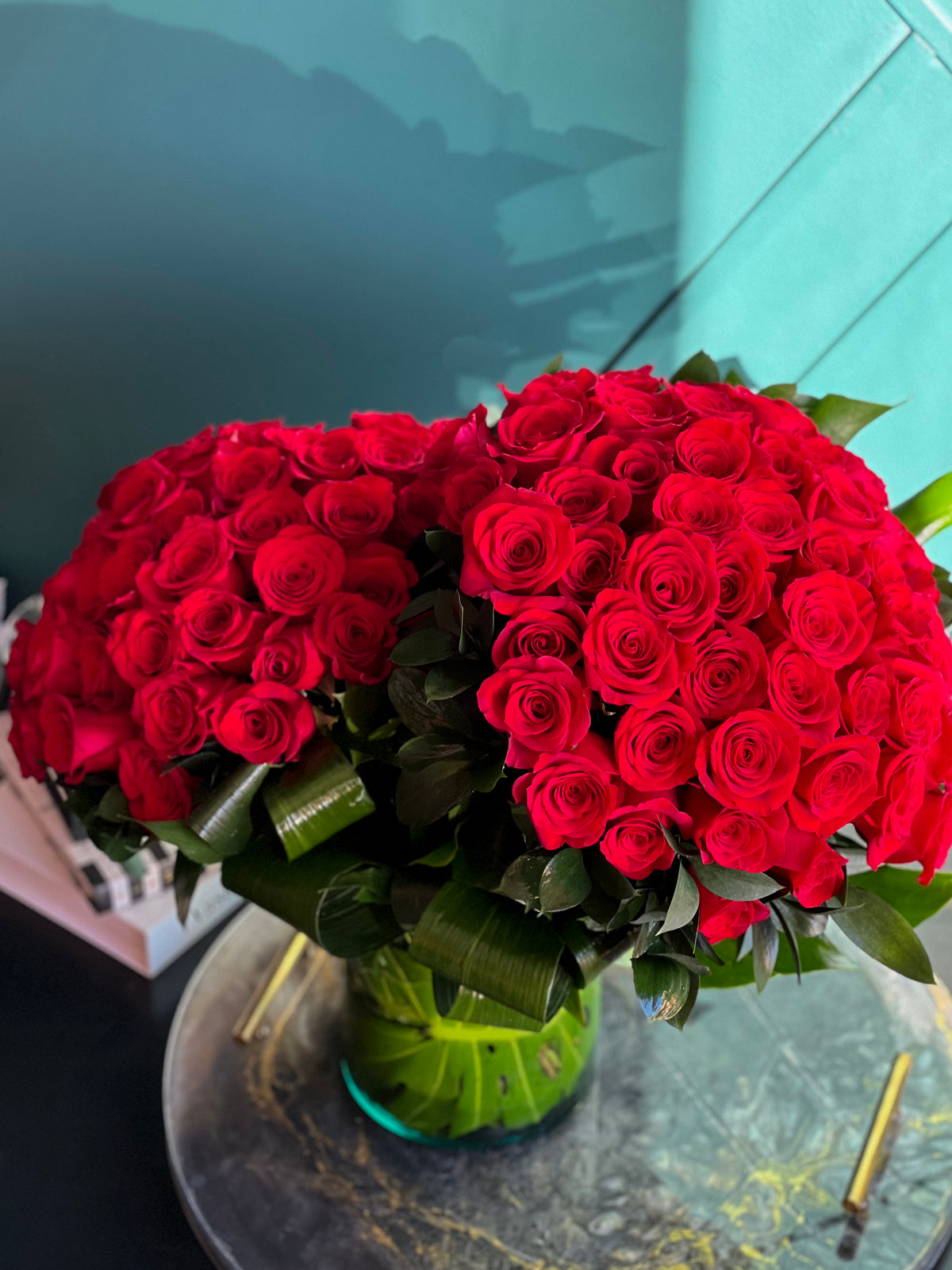 Large arrangement of fresh red roses in Miami
