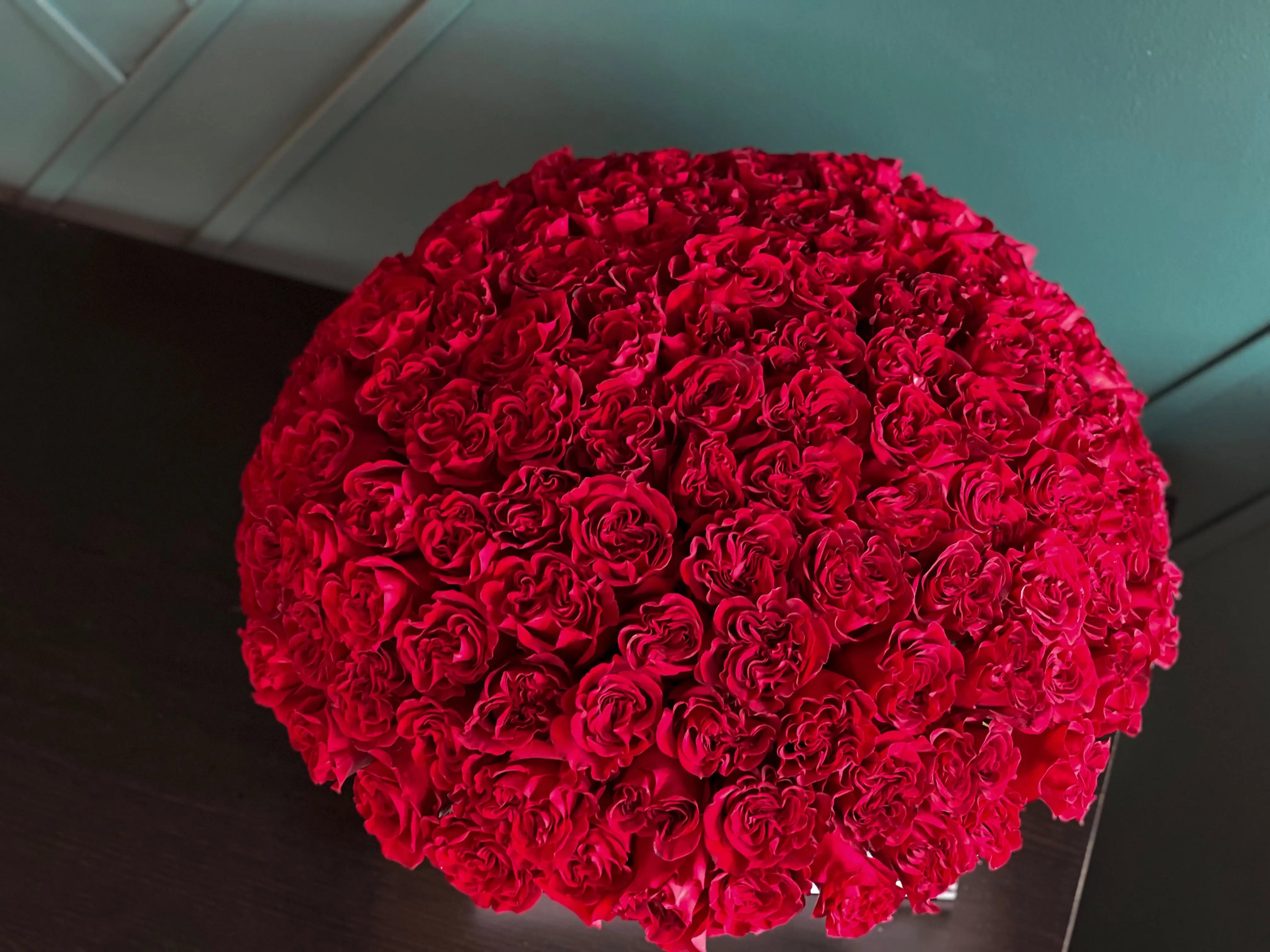 Large arrangement of red roses