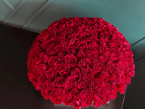 Large arrangement of red roses
