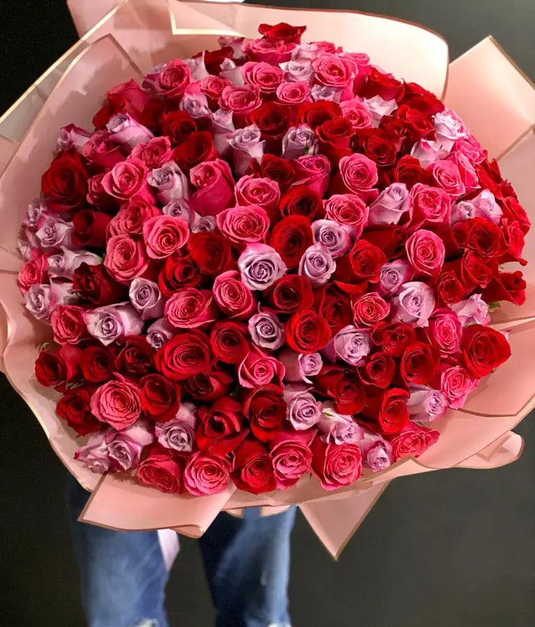 Large bouquet of red pink and purple roses