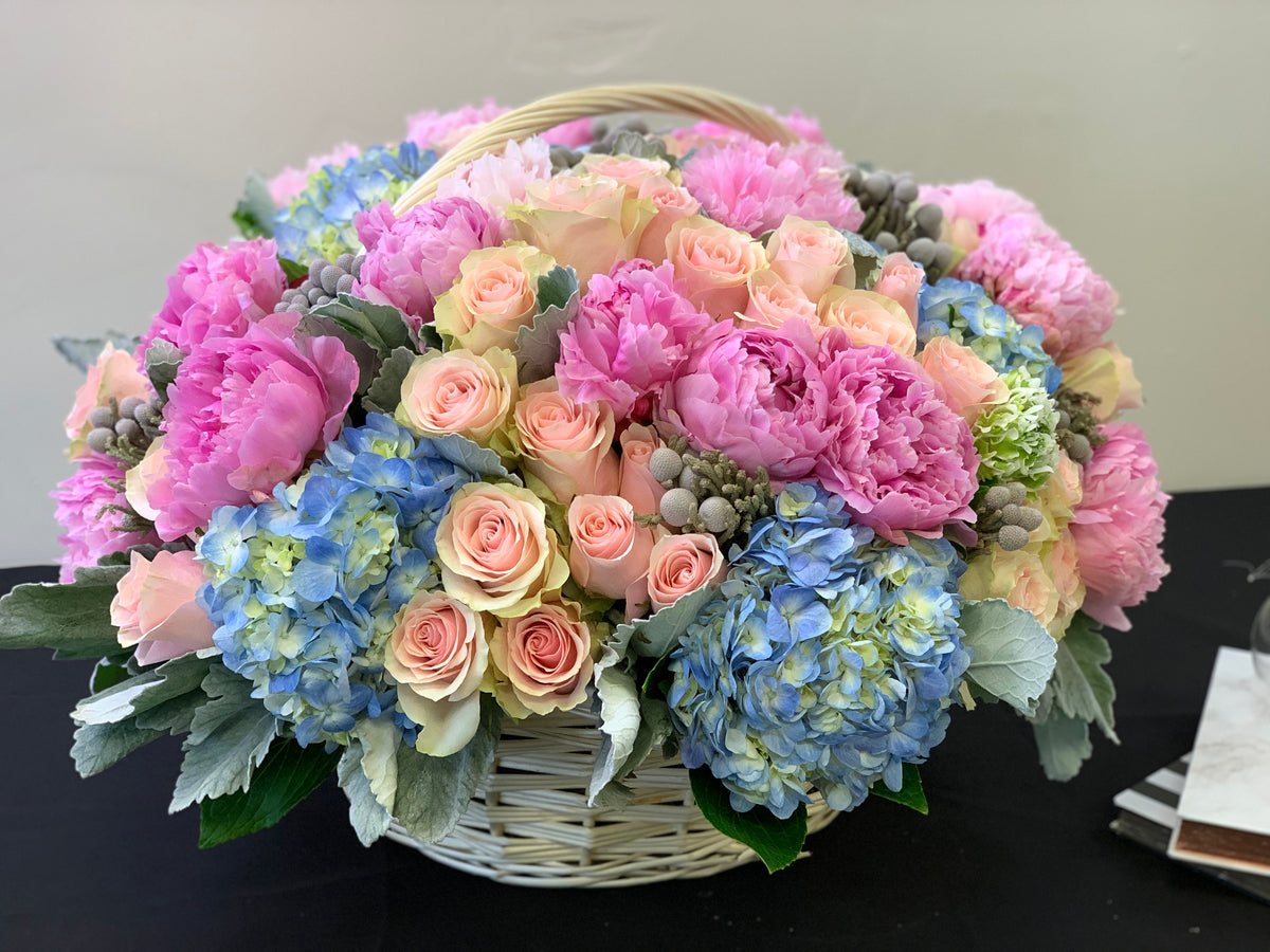 Large luxury floral basket with pastel pink and blue flowers