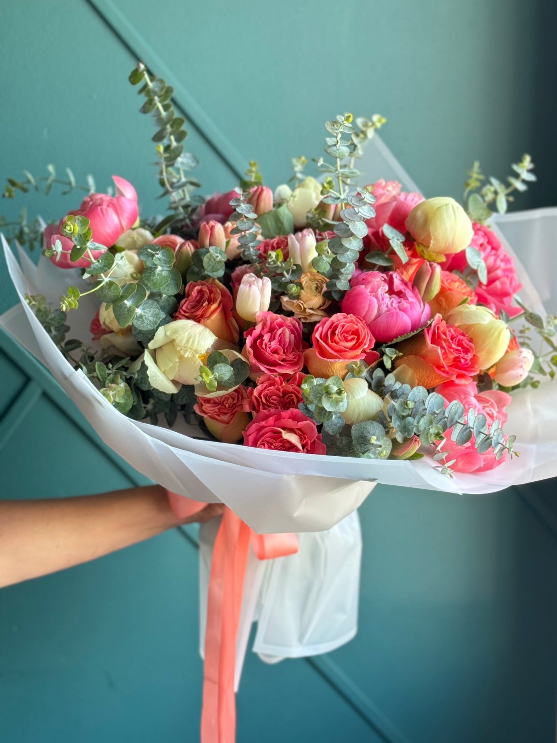 Large peony and garden rose bouquet with eucalyptus greenery