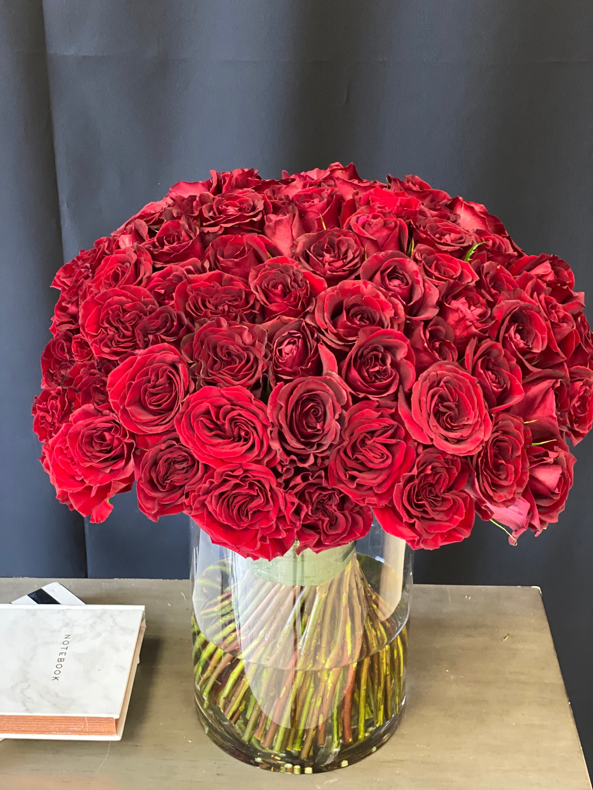 Large red rose vase arrangement for Miami flower delivery