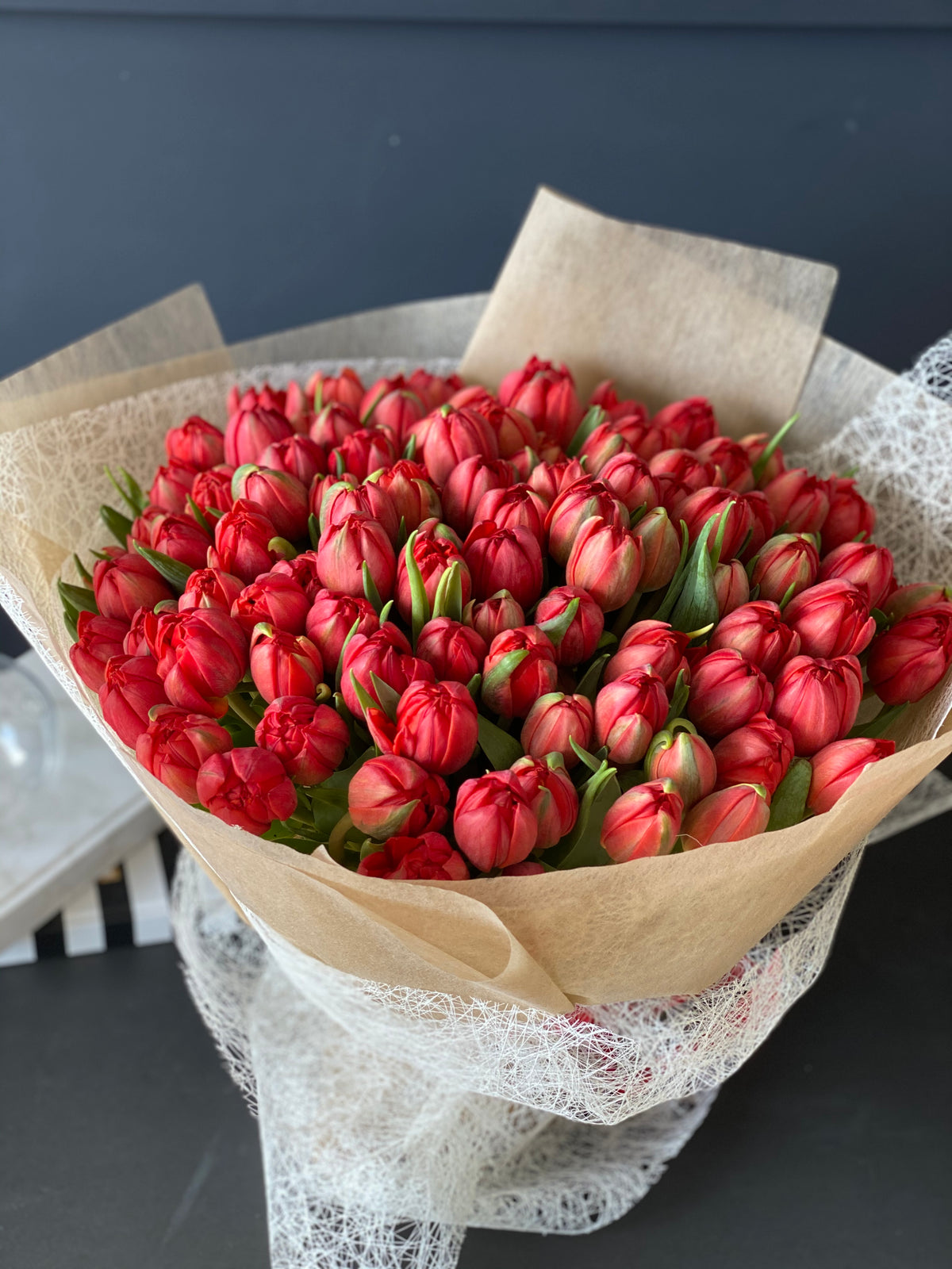 Large red tulip bouquet by Luxury Flowers Miami