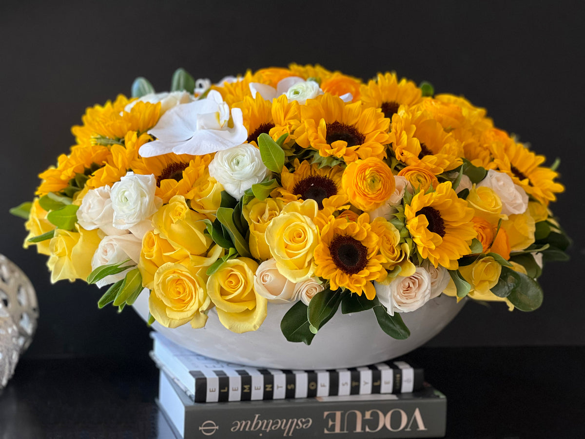 Large sunflower and yellow roses flower arrangement Miami Beach
