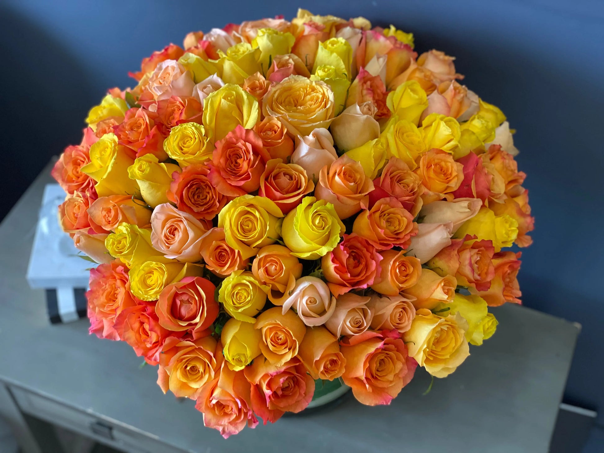 Large yellow and orange rose arrangement for Miami flower delivery
