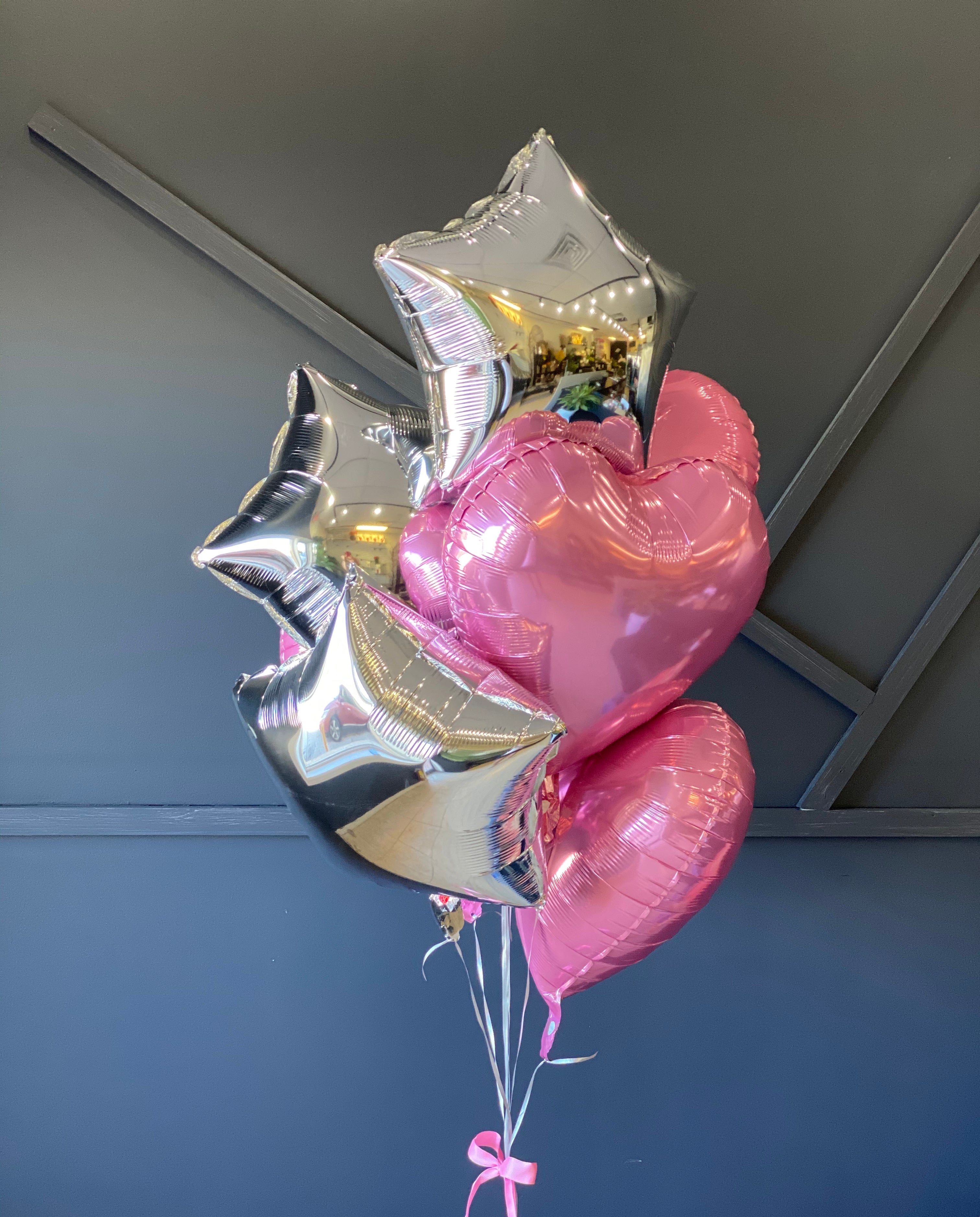 Light pink and silver balloons for birthday delivery in Miami
