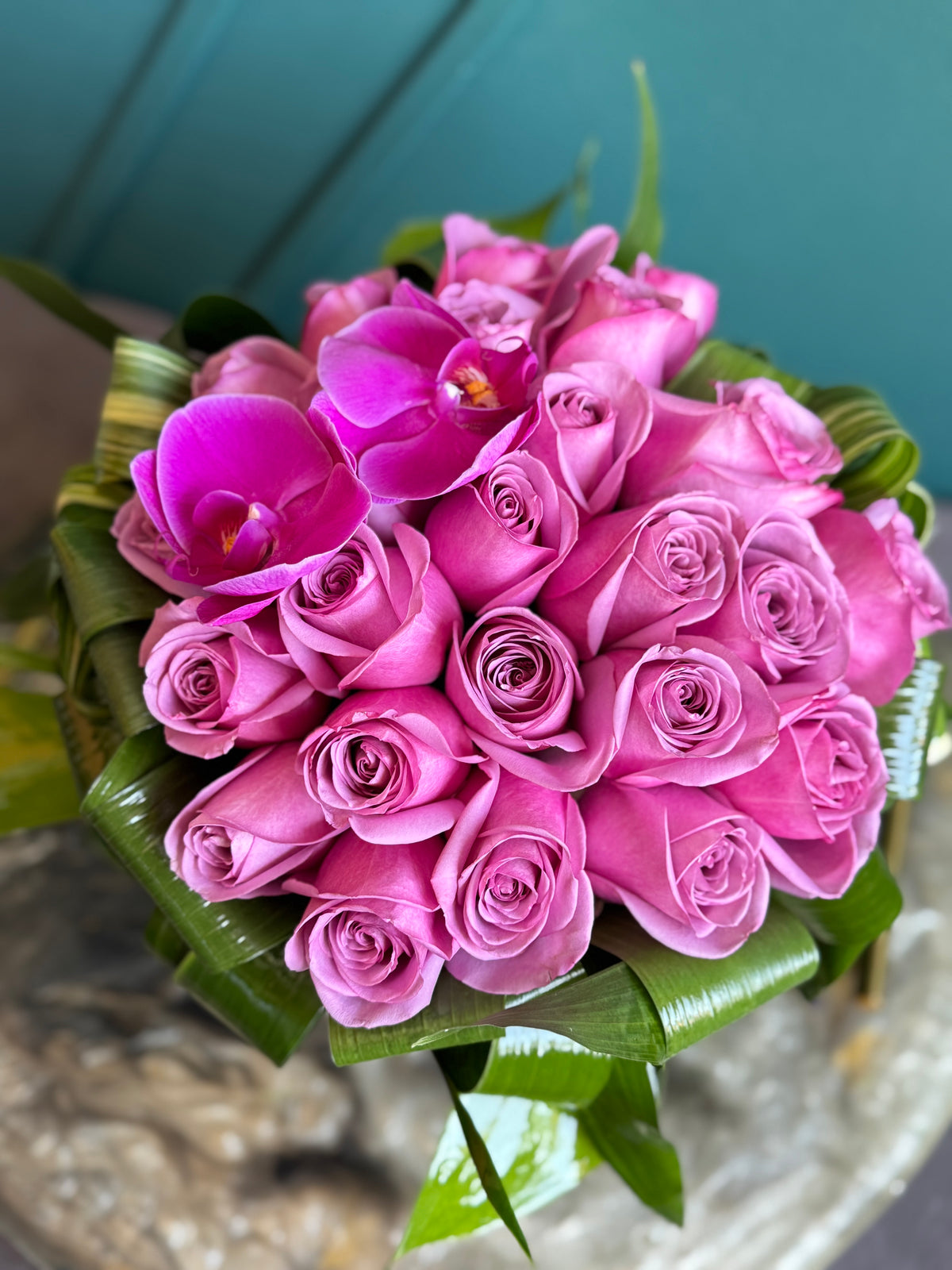 Luxury 24 purple roses arrangement with fresh greenery