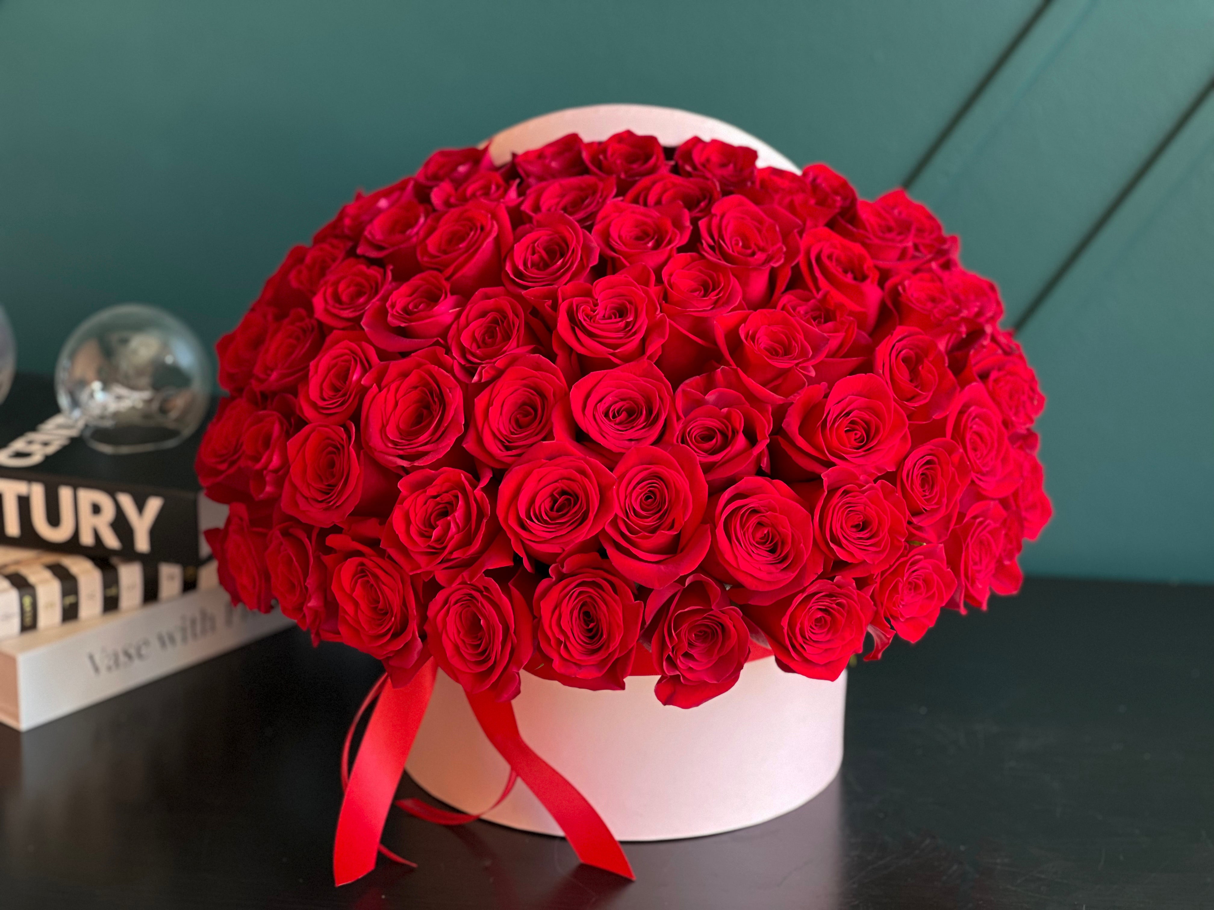 Luxury 75 red roses arrangement in a round box