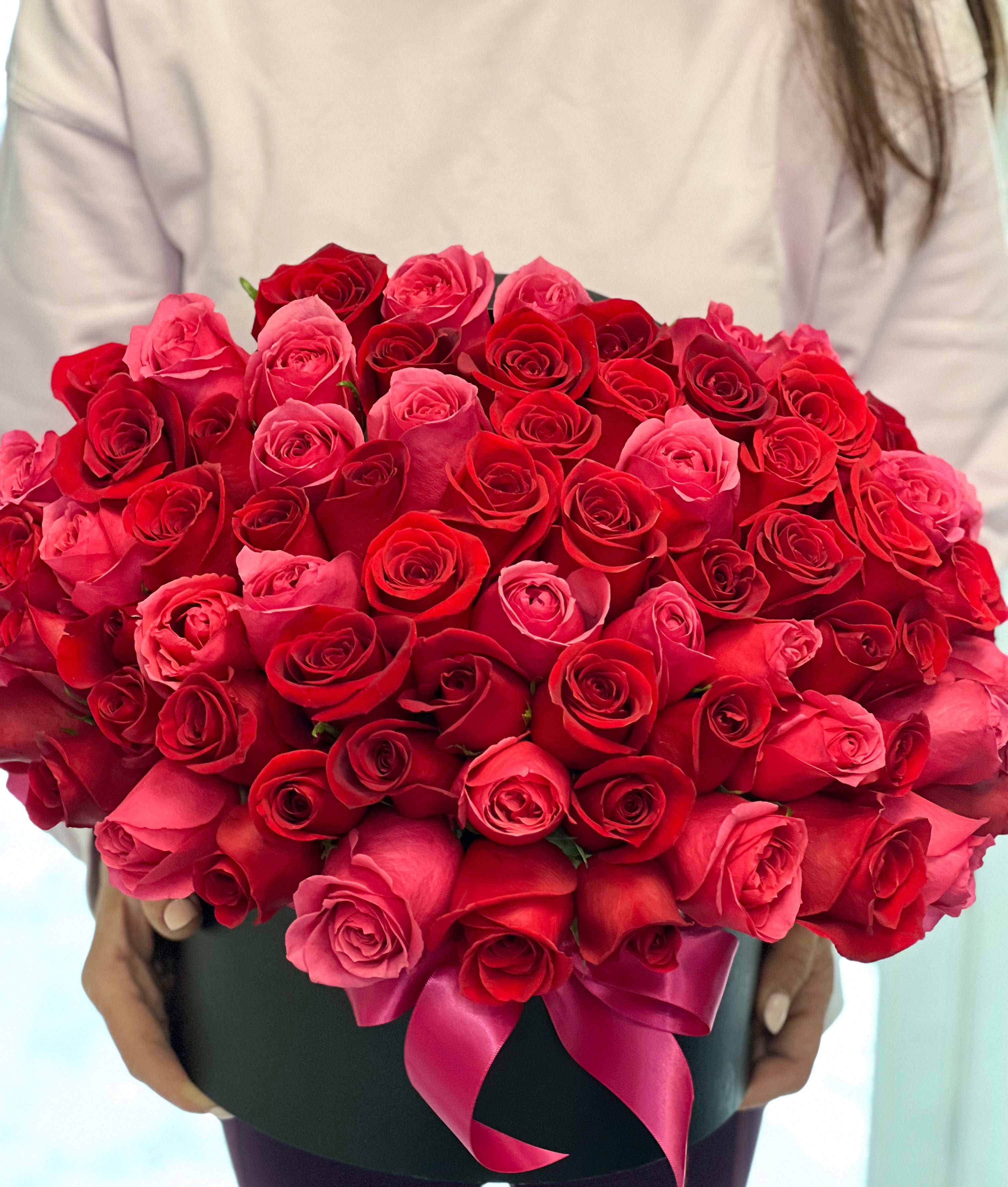 Luxury 75 rose arrangement handcrafted in Miami Beach