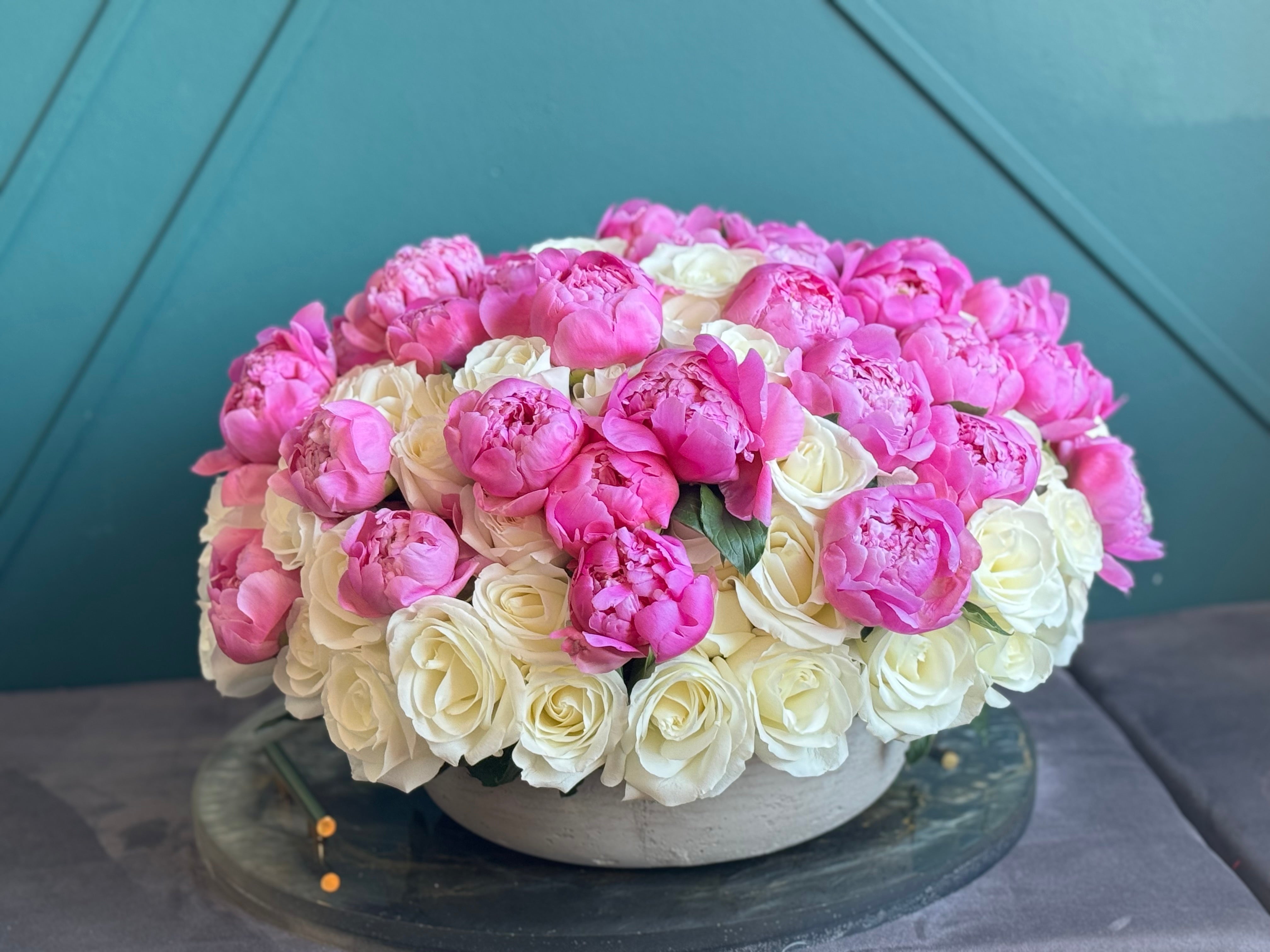Luxury Flowers Miami arrangement with 100 white roses and 50 peonies