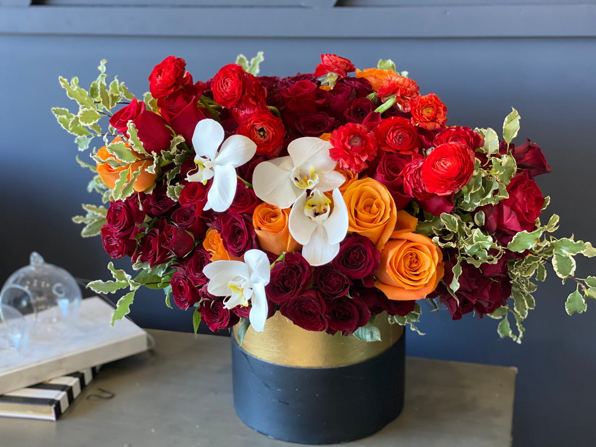 Luxury Thanksgiving flower arrangement with roses and orchids