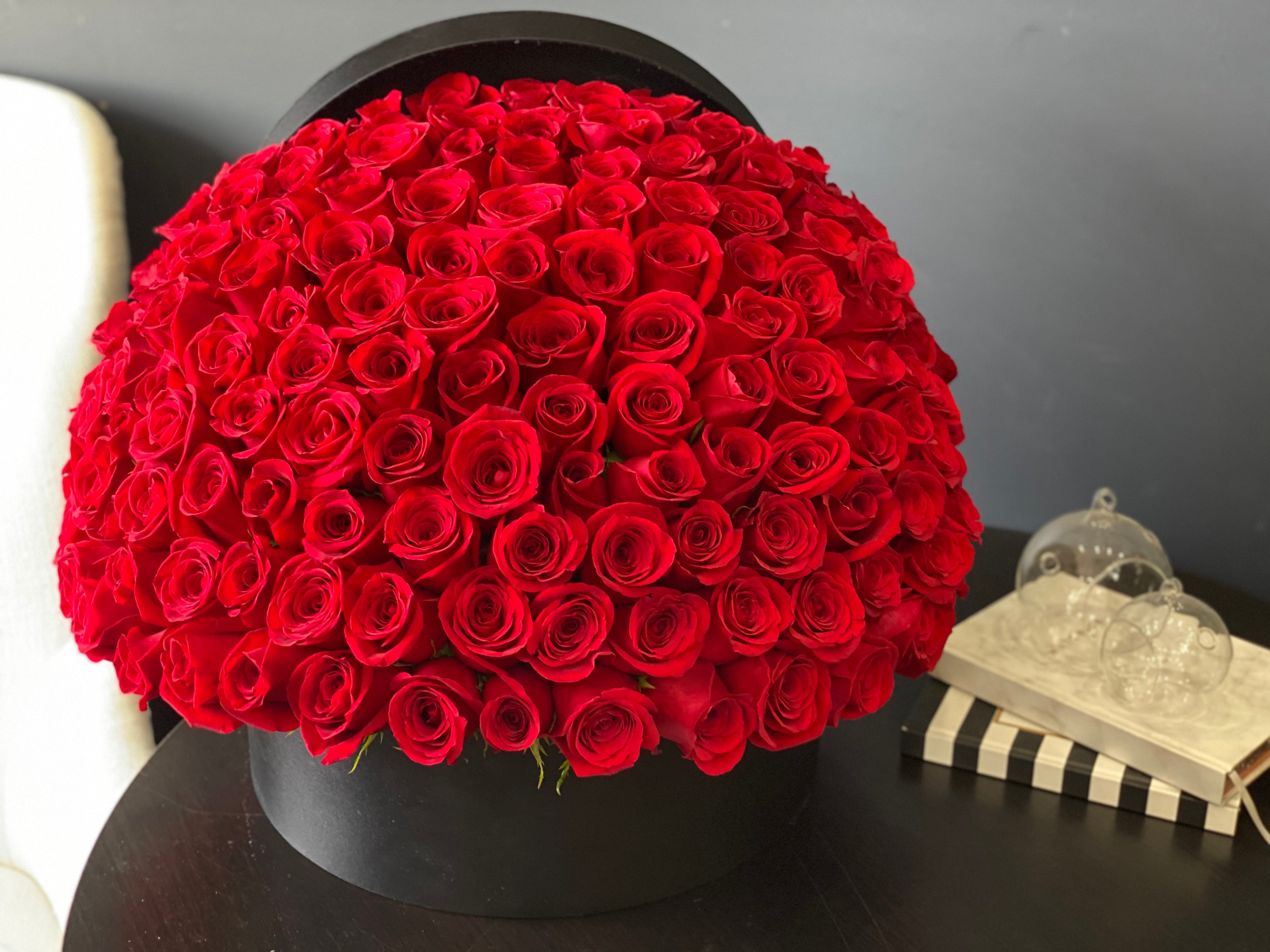 Luxury arrangement of 150 red roses in elegant black flower box