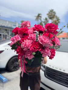 Luxury black flower box filled with fresh pink French roses