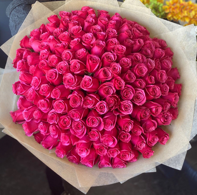Luxury bouquet of 100 fresh hot pink roses by Luxury Flowers Miami