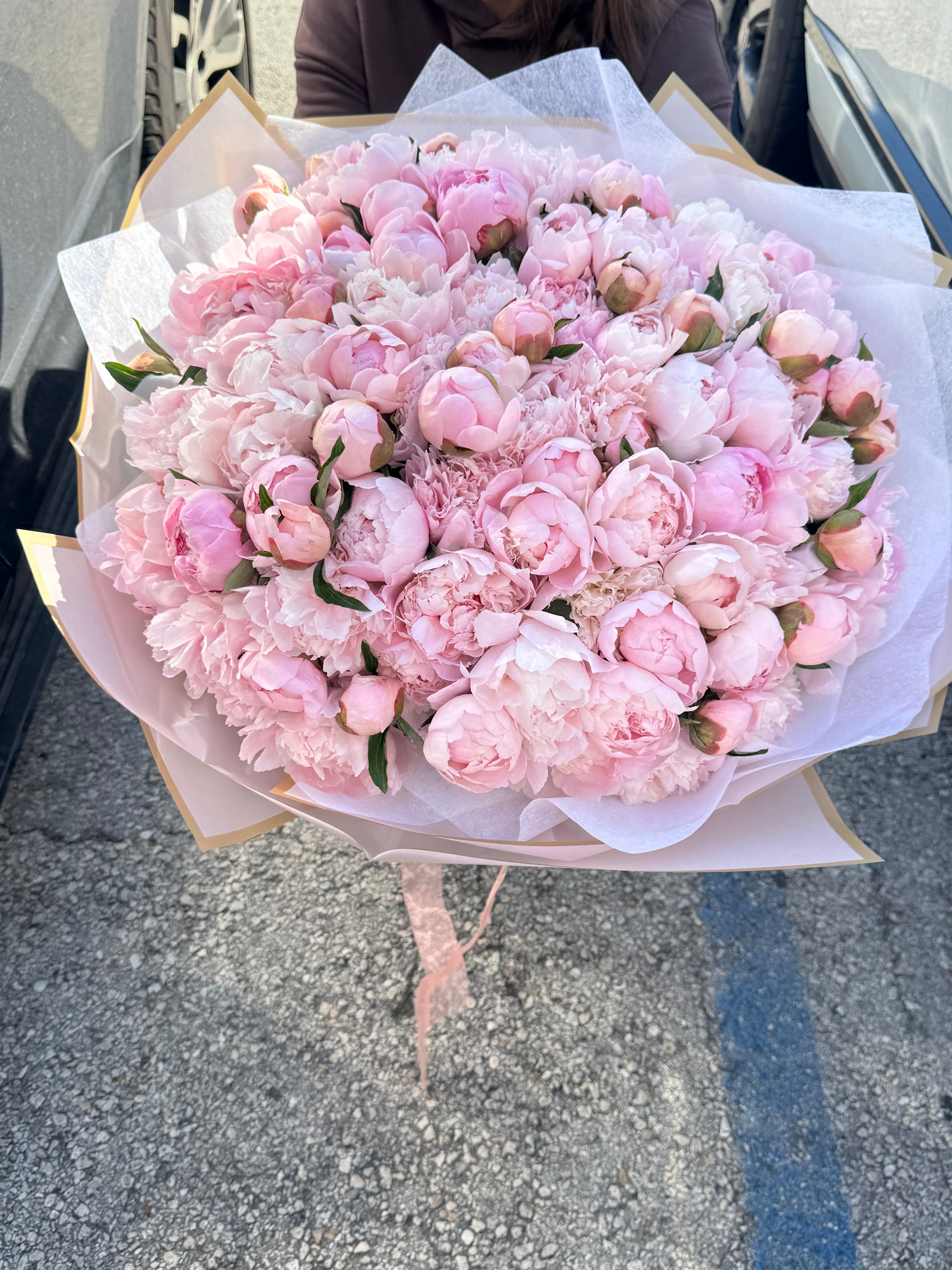 Luxury bouquet of 100 fresh pink peonies
