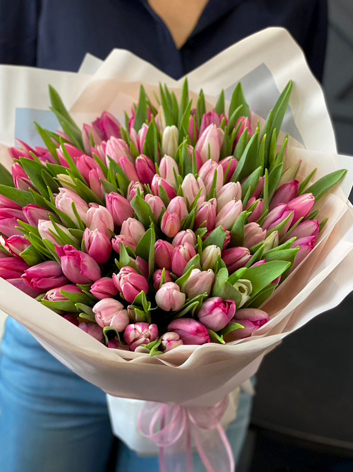 Luxury bouquet of 100 light pink and pink tulips