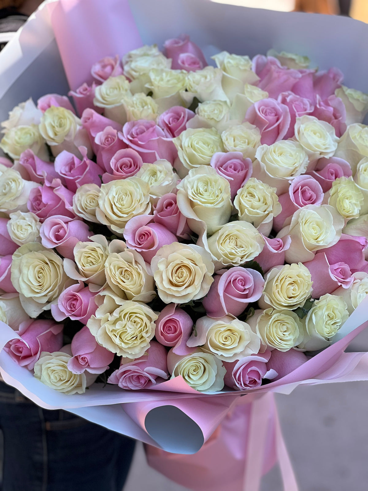 Luxury bouquet of 100 white and assorted pink roses