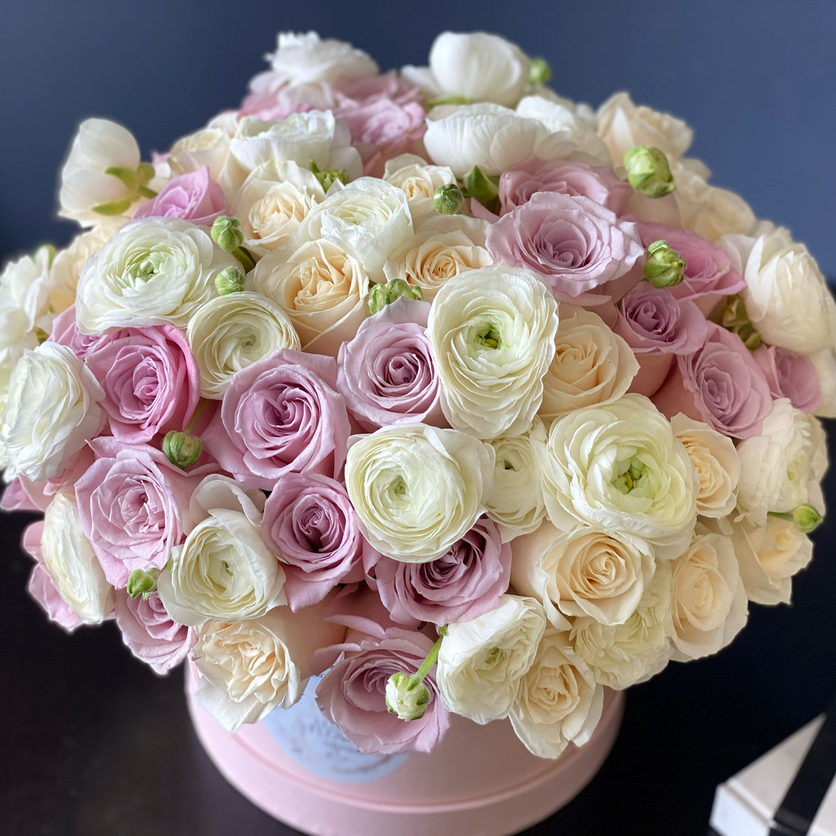 Luxury boxed roses and ranunculus flower arrangement