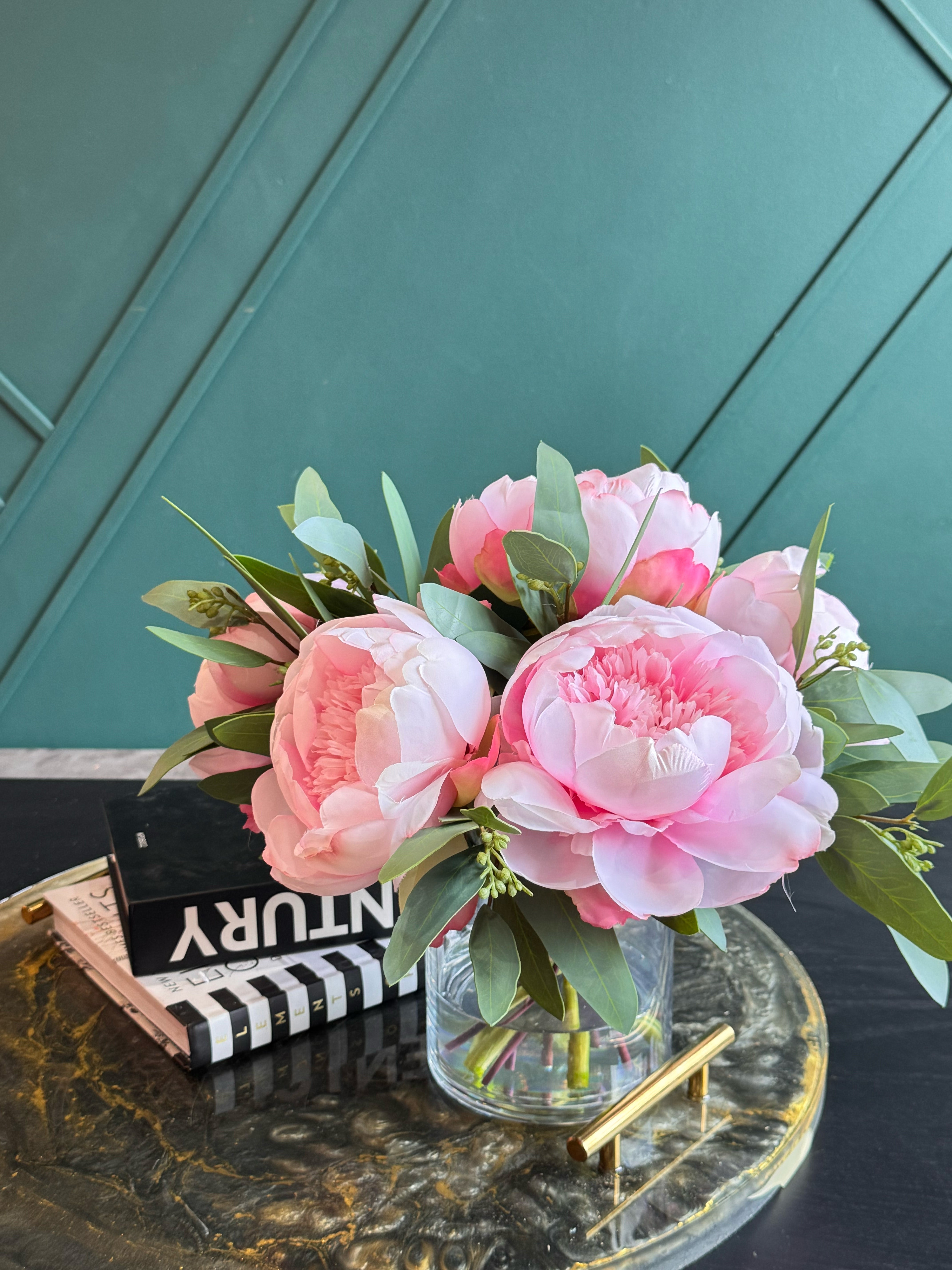 Luxury faux pink peony arrangement displayed in a modern glass vase for coffee tables and dining rooms.