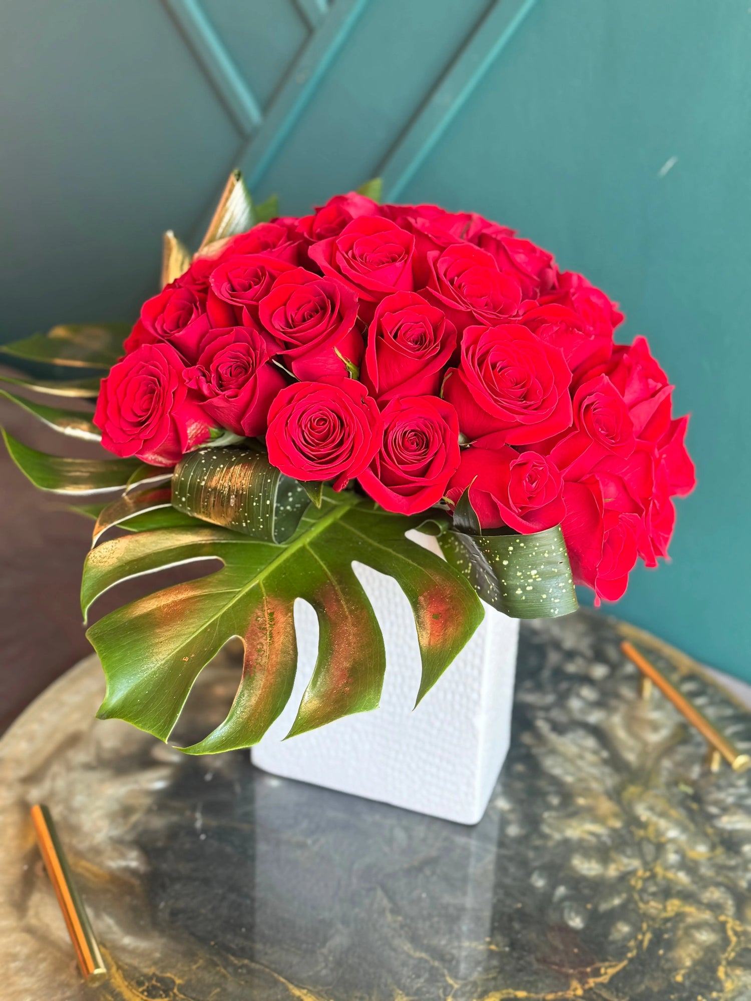Luxury flower arrangement with red roses