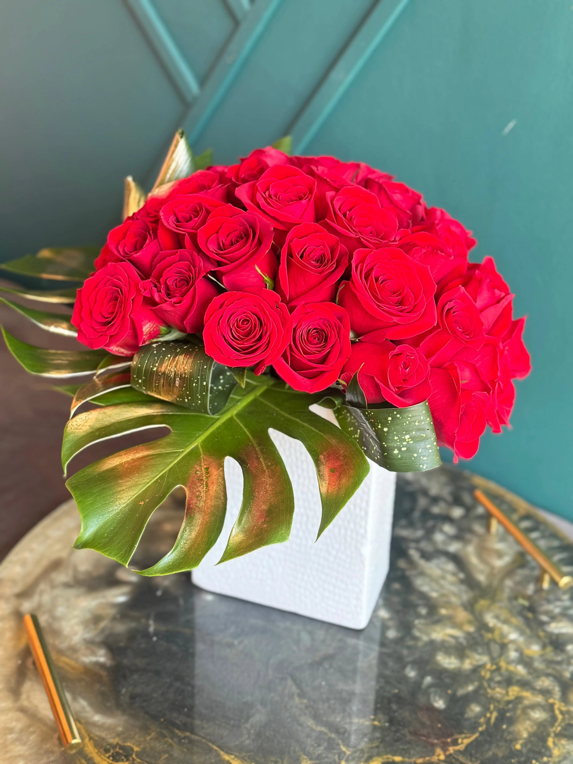 Luxury flower arrangement with red roses