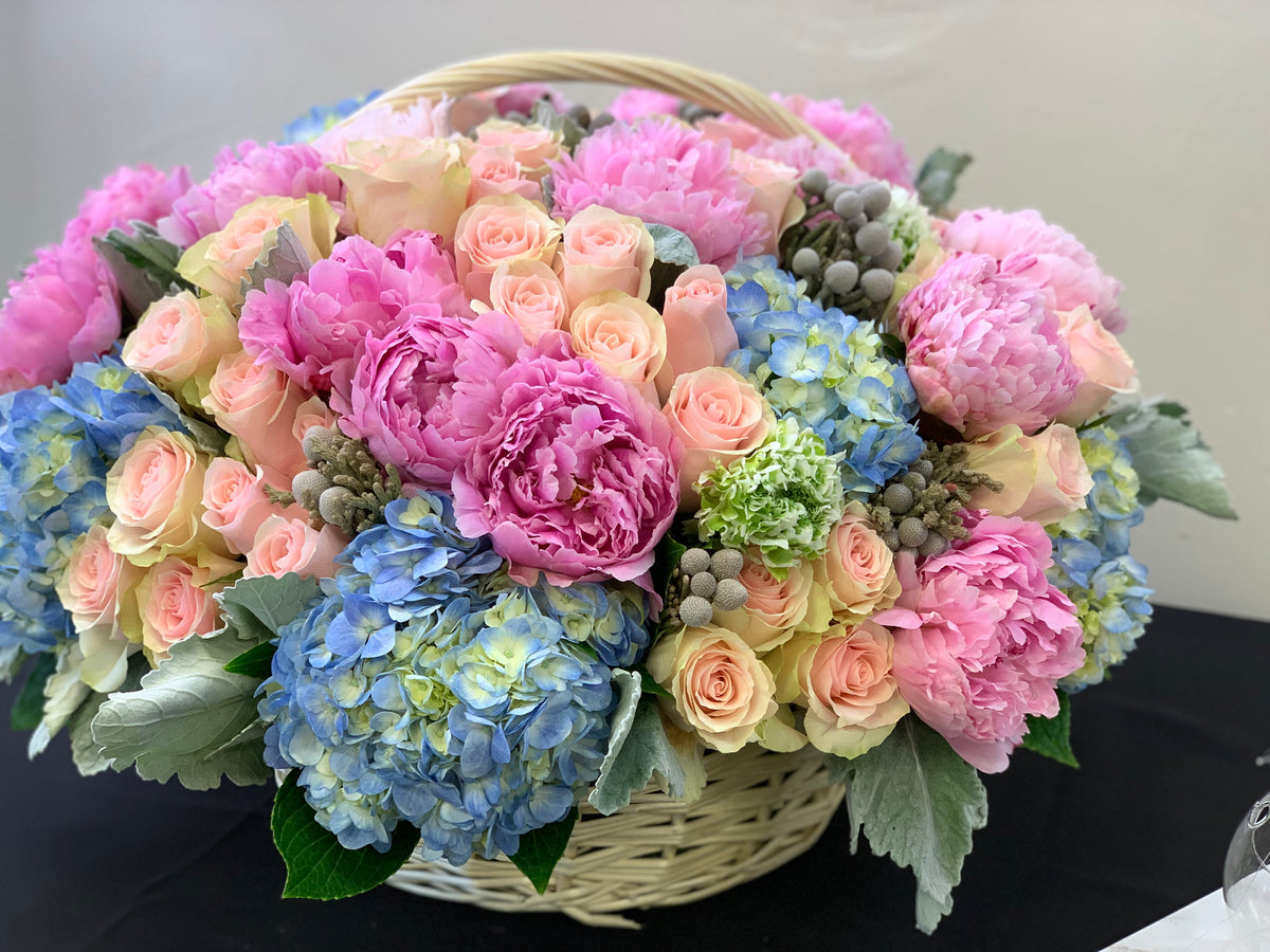 Luxury flower gift basket with hydrangeas and premium roses Miami