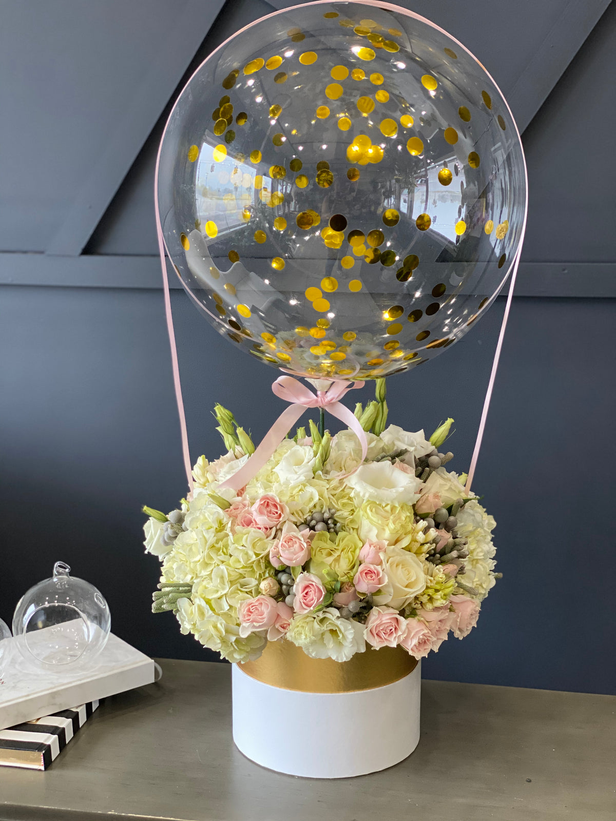 Luxury flowers in a box with clear balloon Miami