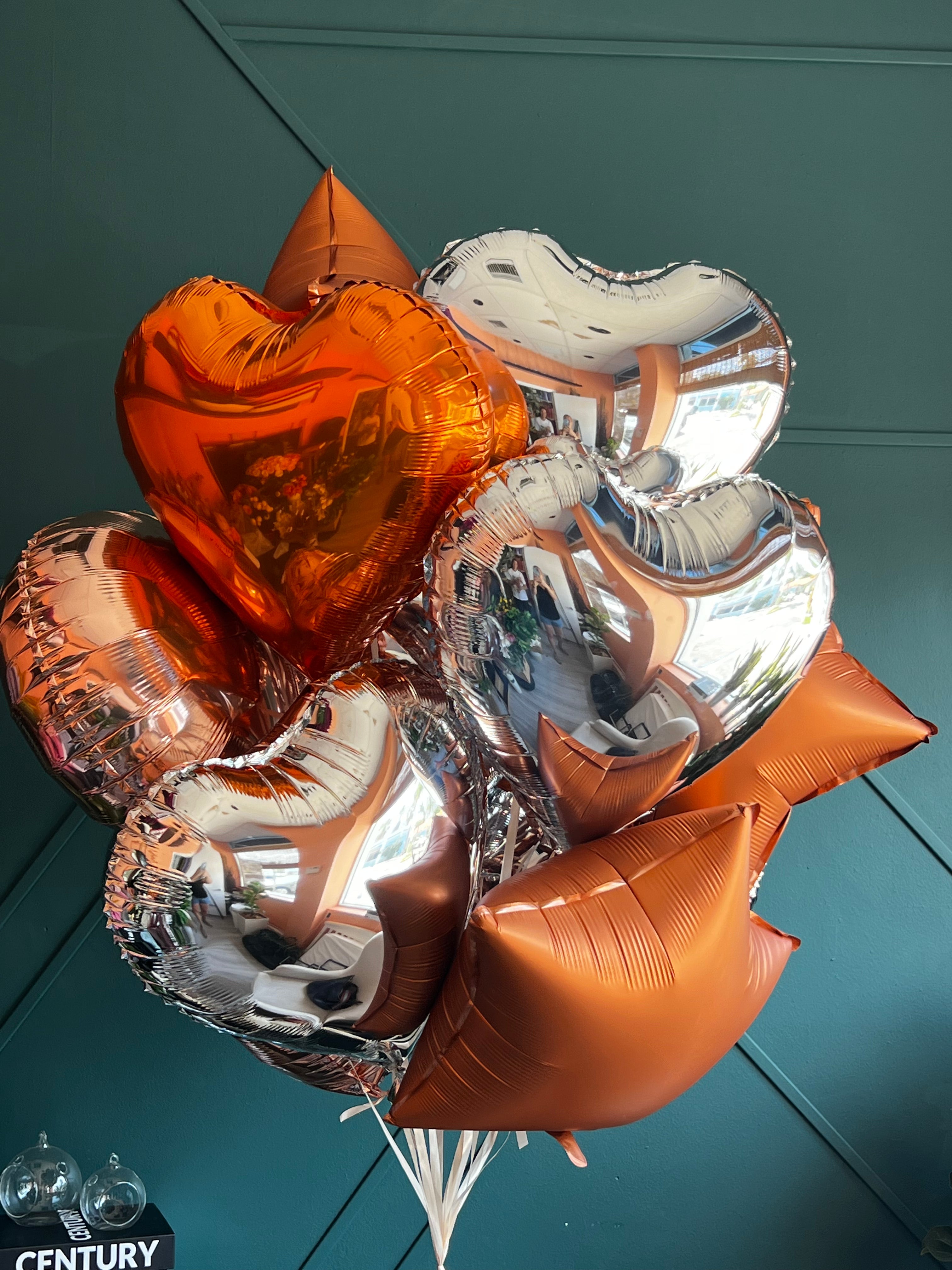 Luxury foil balloon bouquet with gold rose gold and silver balloons