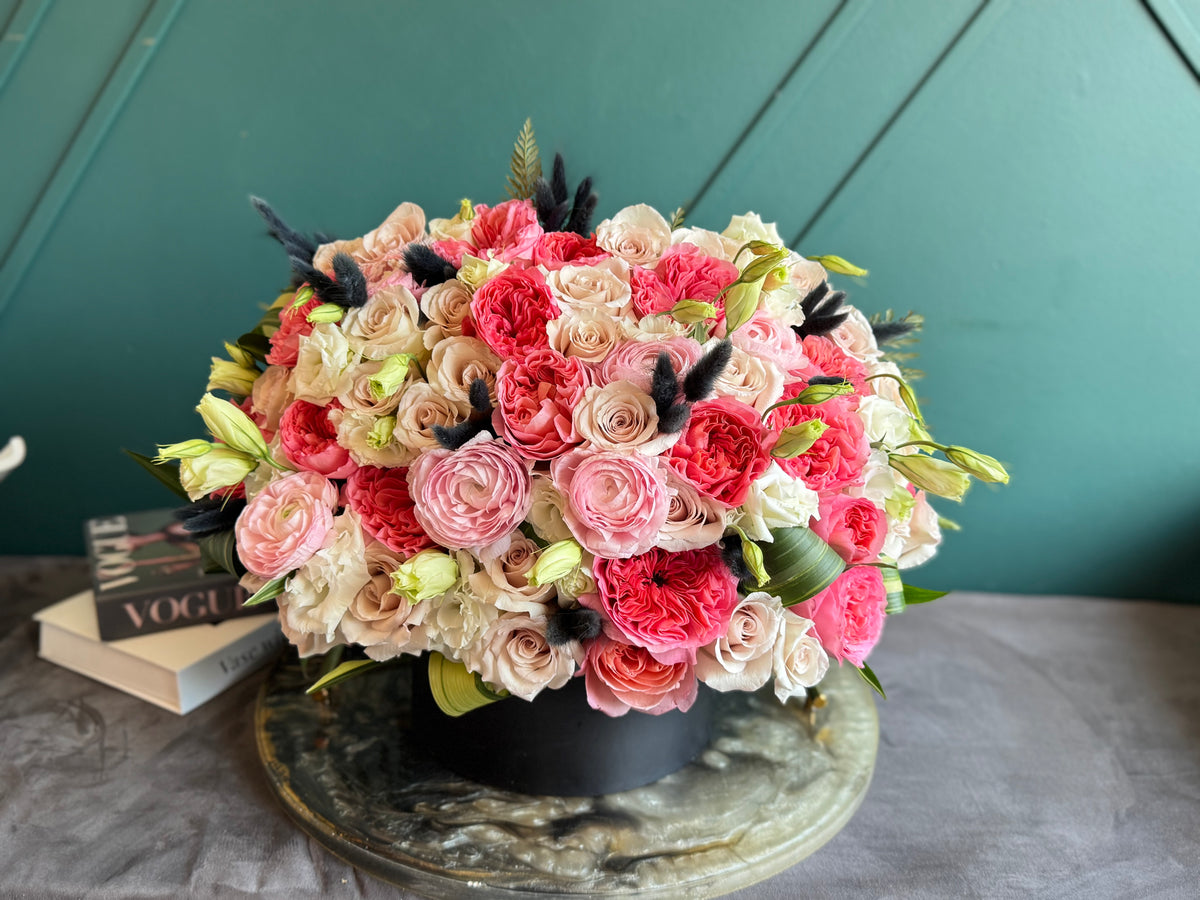 Luxury garden roses and ranunculus arrangement