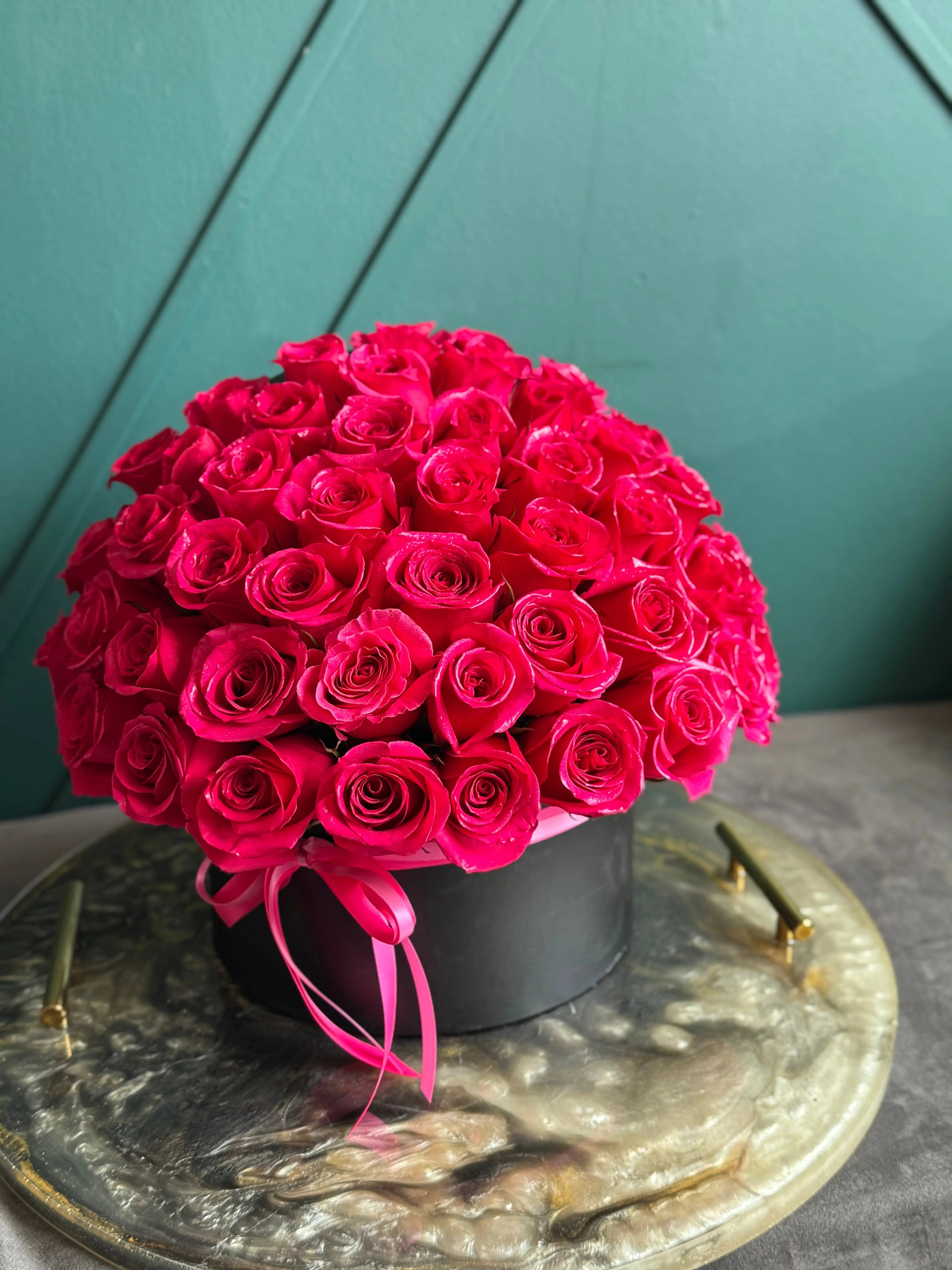 Luxury hot pink roses in a modern box for Miami flower delivery