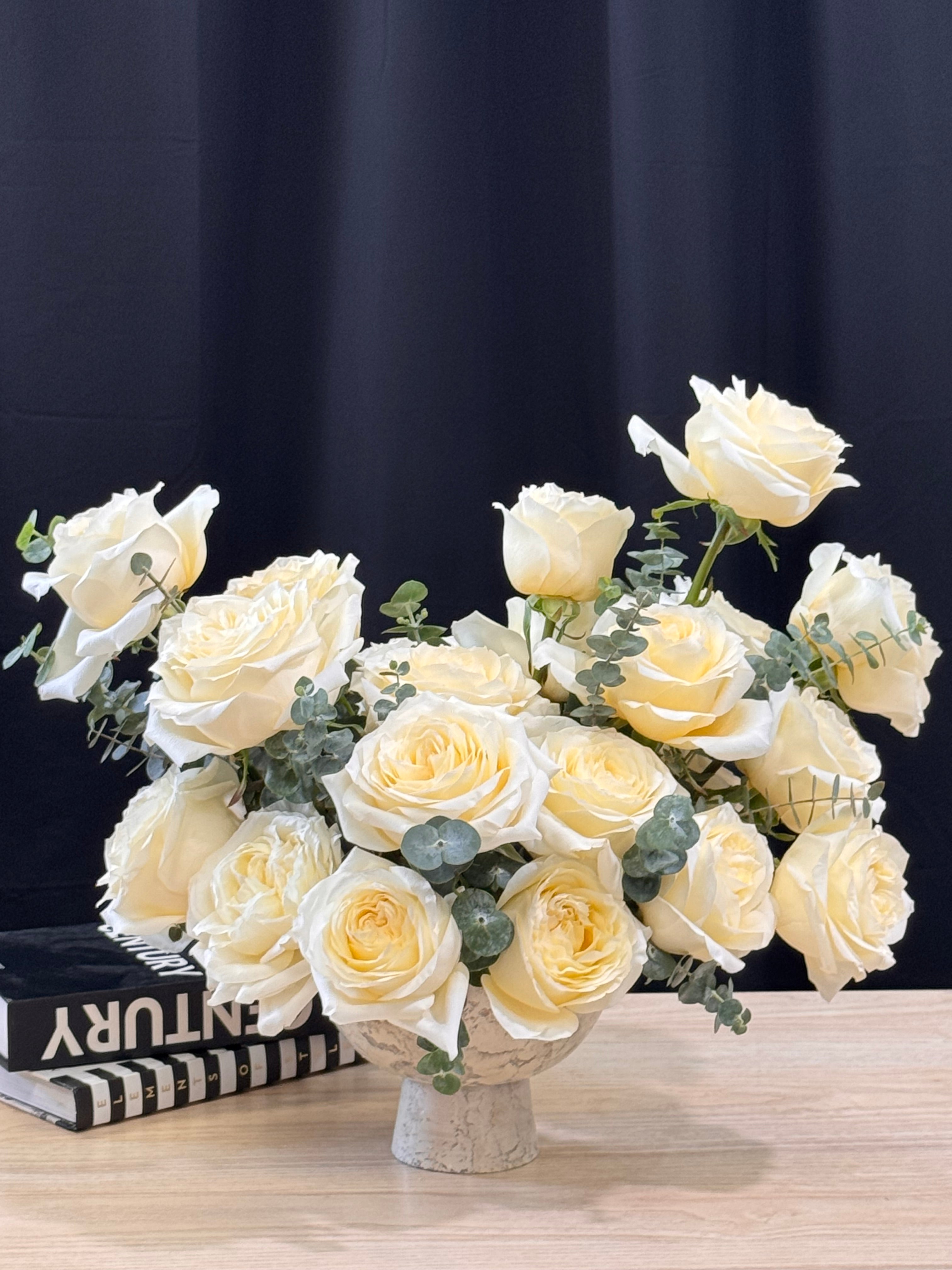 Luxury ivory French rose arrangement in a low vase