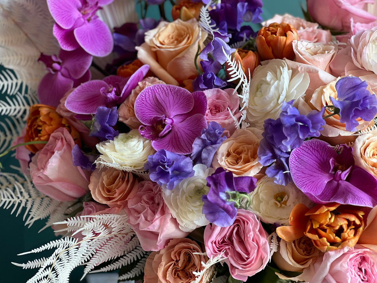 Luxury orchid and rose flower arrangement in Miami