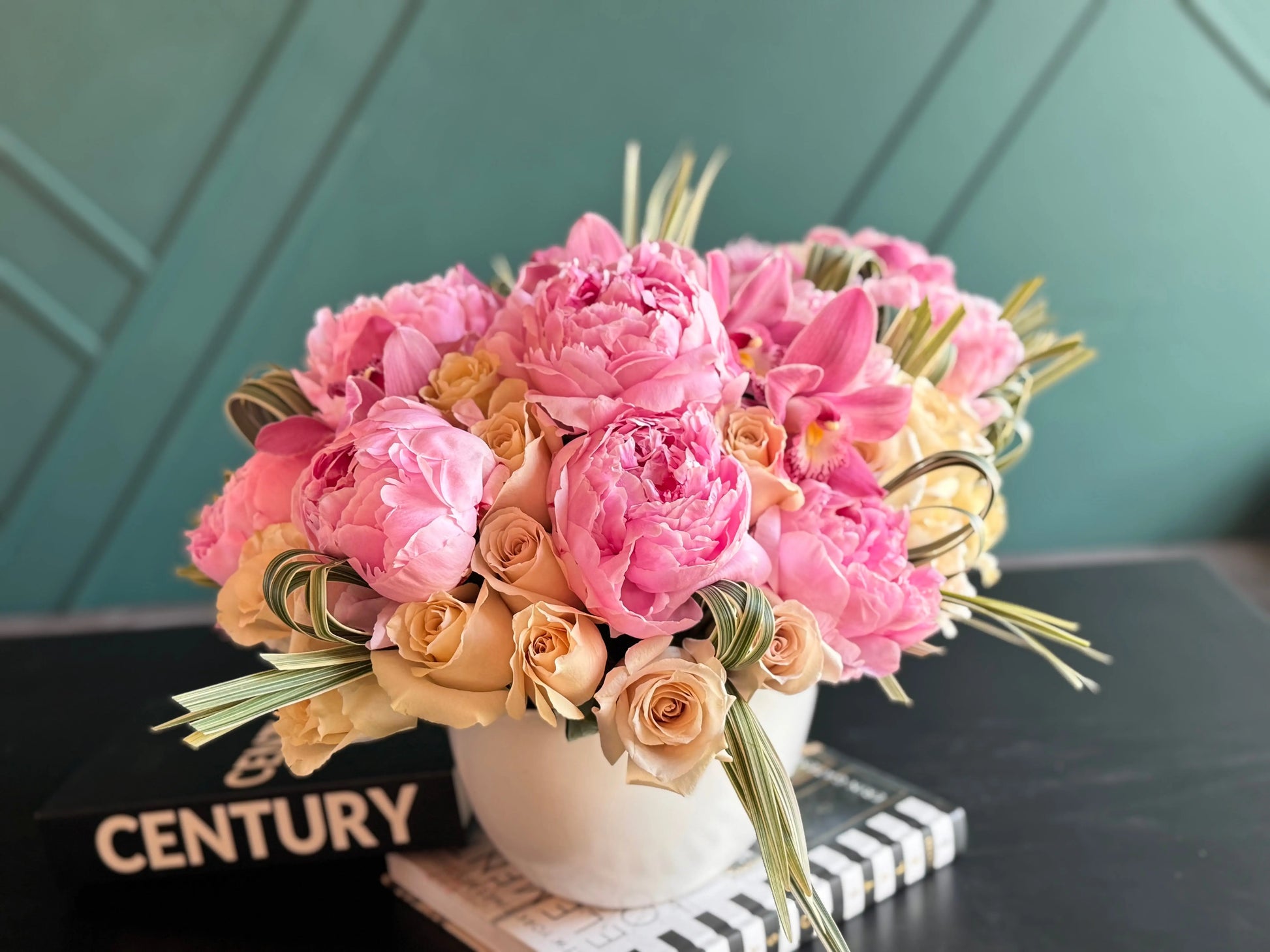 Luxury peonies cappuccino roses and orchids arrangement in ceramic vase by Luxury Flowers Miami